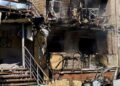 У вогні перші й верхні поверхи: ворог атакував будинок на Дніпропетровщині